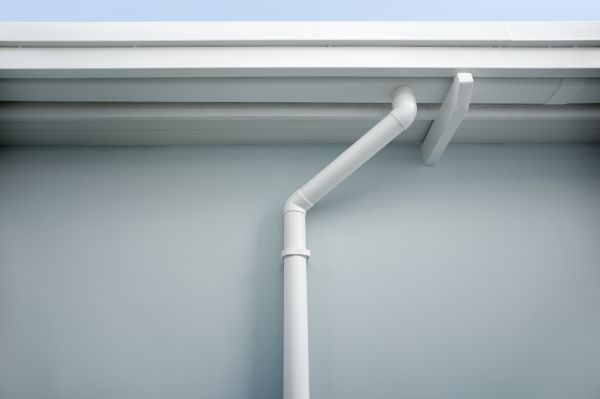 Downspout Unclogging in Brick
